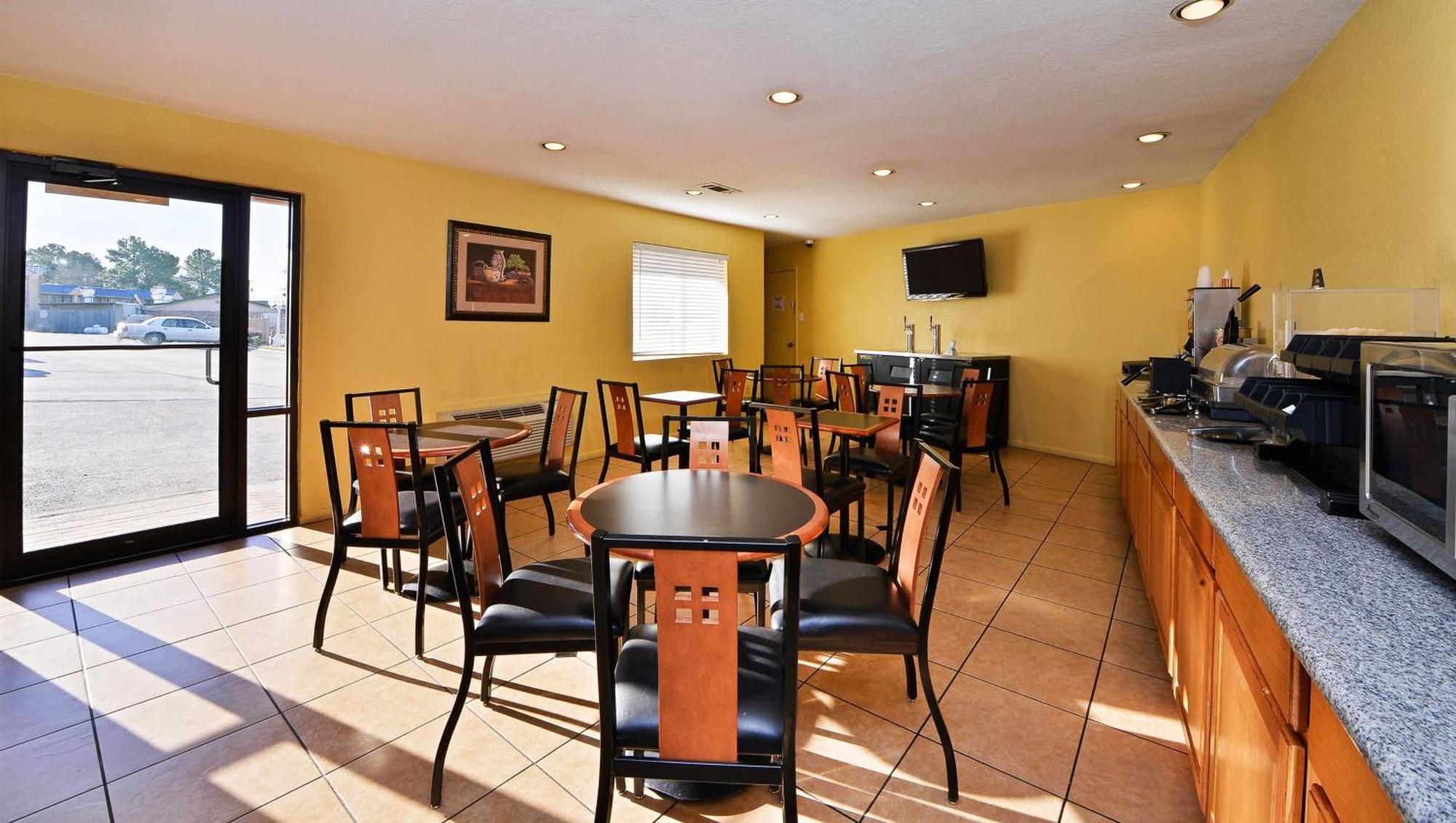 Xecutive Inn And Suites Center Bagian luar foto